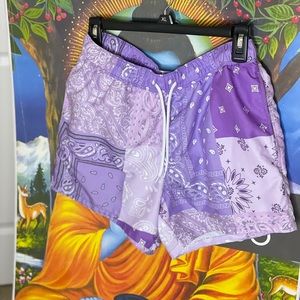 Purple & white bandanna print swim trunks